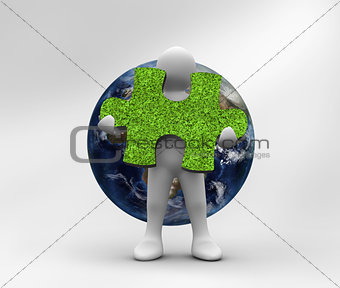 Human representation holding a grass jigsaw puzzle