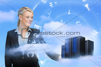 Businesswoman looking at data servers