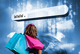 Girl with shopping bags looking at address bar with data servers