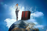 Businessman racing on top of the world beside server