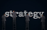 Multiple image of a businessman writing strategy