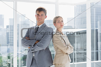 Business colleagues standing in their office