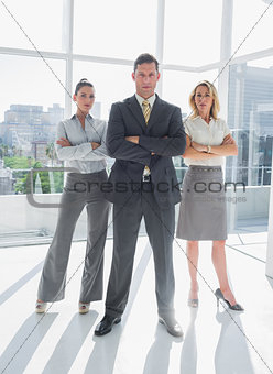Portrait of confident business people standing together