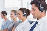 Group of agents sitting in line in a call centre