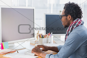 Creative business worker on computer