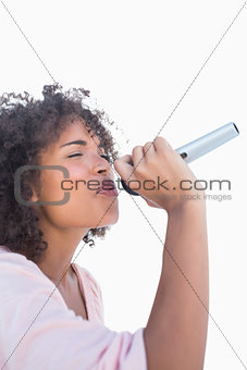 Woman singing at karaoke