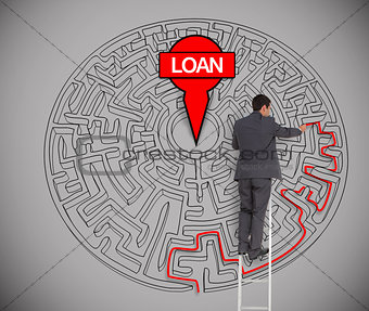 Businessman trying to find a loan in a maze