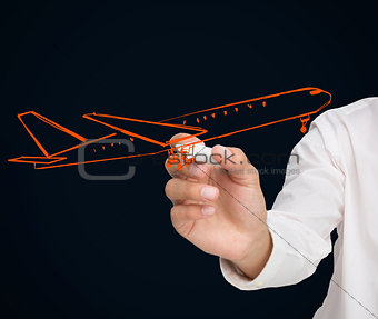 Buisnessman drawing orange airplane