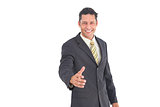 Smiling man with raised hand