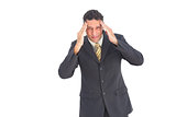 Anxious businessman with hands on his head