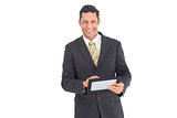 Smiling businessman with pc tablet