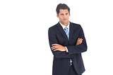 Serious businessman with crossed arms