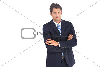 Serious businessman with crossed arms