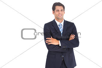 Stylish businessman with crossed arms