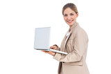 Smiling businesswoman with a laptop