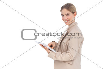 Smiling businesswoman with tablet pc