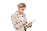 Businesswoman looking at digital tablet