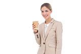 Smiling businesswoman holding a coffee cup