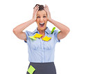 Businesswoman shouting with adhesive notes on her shirt