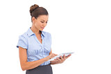 Businesswoman touching digital tablet