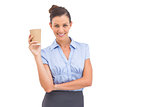 Attractive businesswoman holding coffee cup