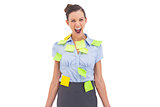 Businesswoman covered with sticky notes