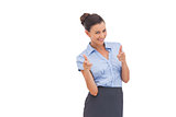Smiling businesswoman showing something with fingers