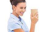 Cheerful businesswoman holding a coffee cup
