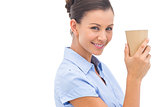 Attractive businesswoman holding a coffee cup