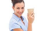 Businesswoman carrying coffee cup