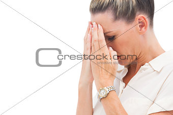 Afraid businesswoman with hands on head