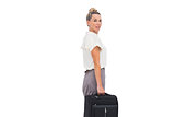 Side view of businesswoman with briefcase