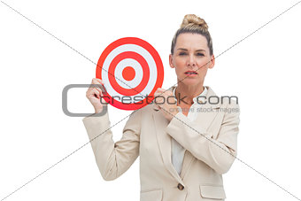 Businesswoman holding target