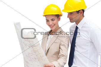 Architect team looking at construction plan