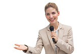 Businesswoman holding microphone
