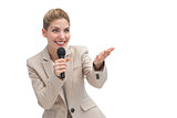 Businesswoman with microphone showing something