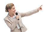 Businesswoman with microphone indicating something