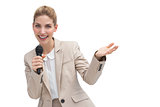 Gesturing businesswoman speaking on microphone