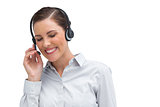 Laughing businesswoman with headset