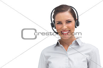 Smiling call centre agent with headset