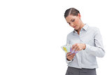 Businesswoman counting her money