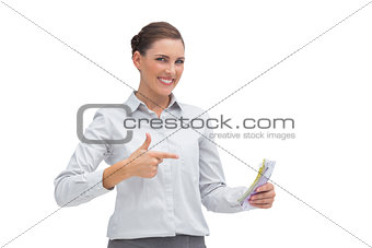 Happy businesswoman with money in her hand