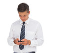 Serious businessman texting