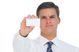 Businessman showing a white blank business card