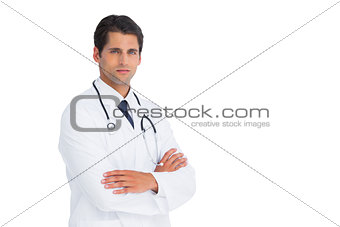 Handsome doctor with arms crossed