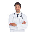 Attractive doctor smiling with arms crossed