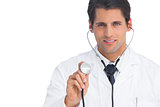 Doctor holding up stethoscope