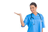 Surgeon holding up hand in presentation