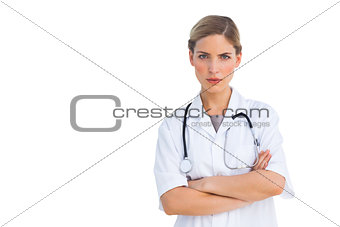 Serious nurse looking at the camera