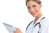 Smiling nurse with tablet pc
